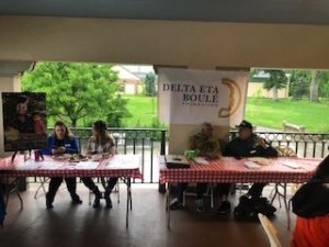 a group of people sitting at tables