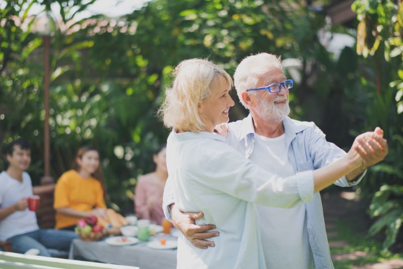 older couple happily dancing